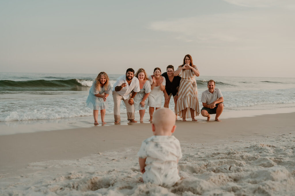 extended family session on the beach with the baby of the family