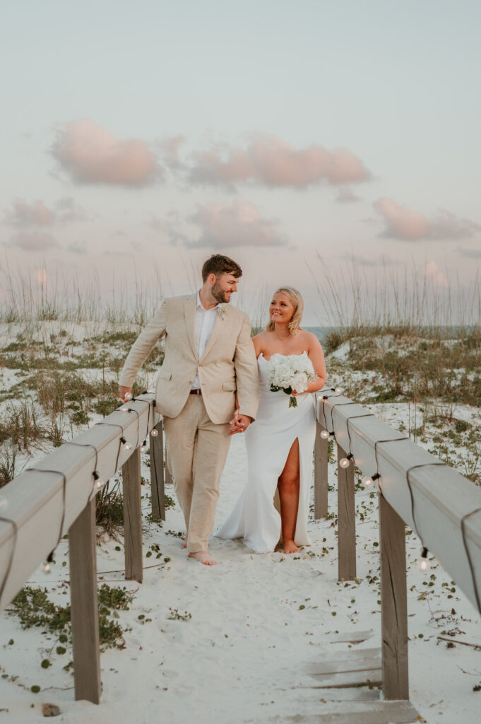 cozy boardwalk to their beach rental for an intimate ceremony.